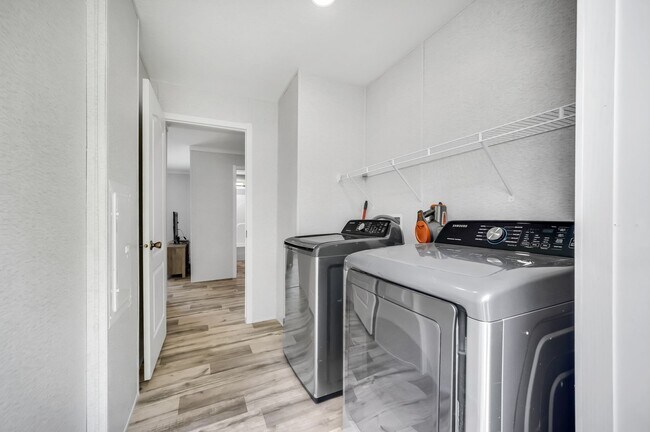 Building Photo - Experience exceptional living at its finest