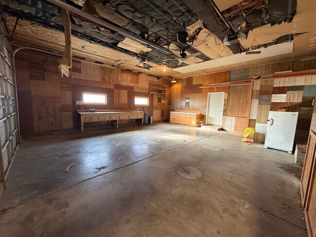 Building Photo - Spacious, four-bedroom, two-bathroom, coun...