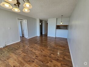 Building Photo - Bright 2-Bedroom Condo with Lanai