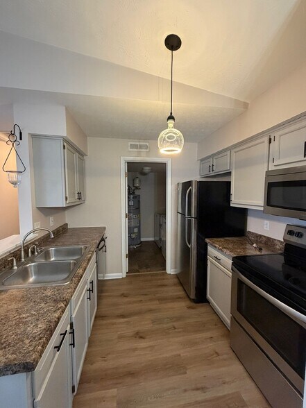 Kitchen + Laundry - 533 Aspen Glen Dr