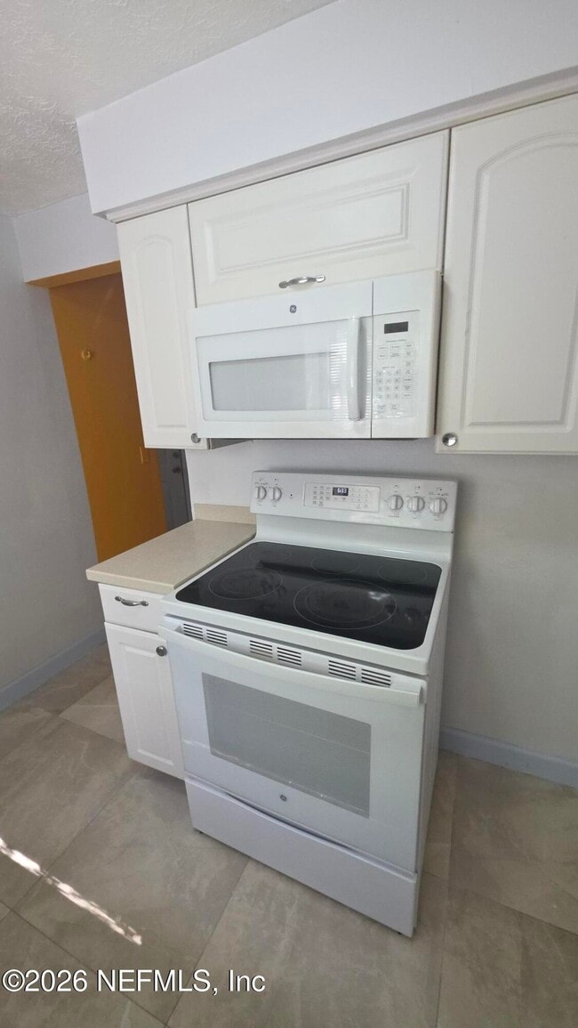 Building Photo - 10791 Luana Dr N