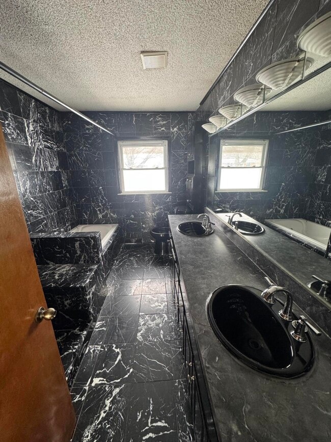 Building Photo - 8405 Robindale Ave