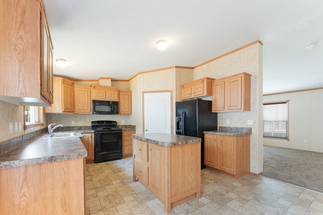 Building Photo - 202 Wild Flower Dr