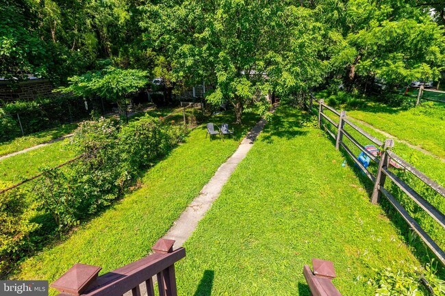 Building Photo - Welcome to this sunny and updated 4-bedroom, 2-bath row home in the heart of Mt. Airy! W/D! Large...