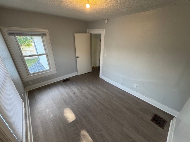 Building Photo - Interested in a two-bedroom house that includes a large garage. Please let us know