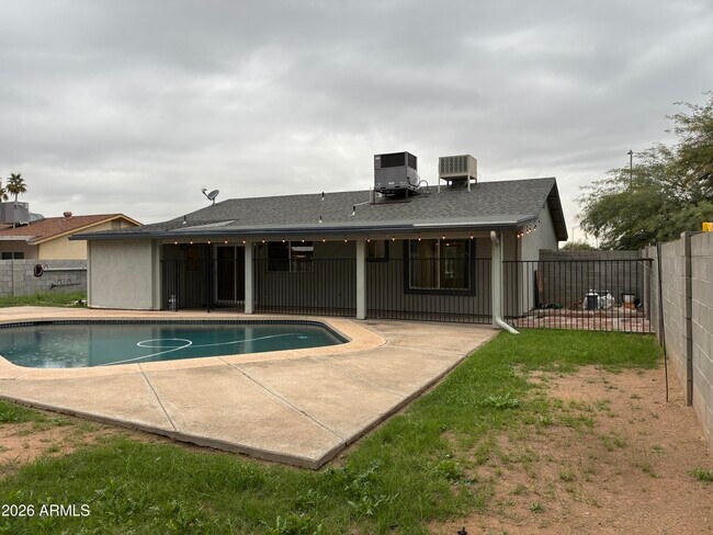 Building Photo - 6713 W Carol Ave