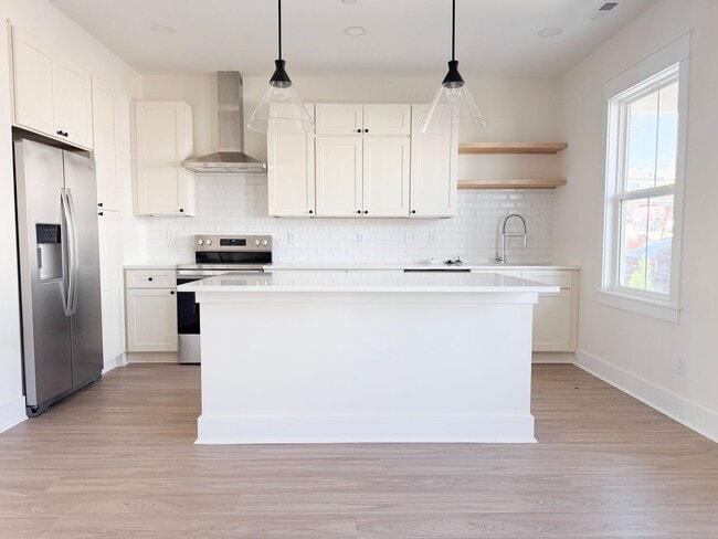 Building Photo - Available August 1: 4-Bedroom Townhome at Highbury + Summer Special Perks