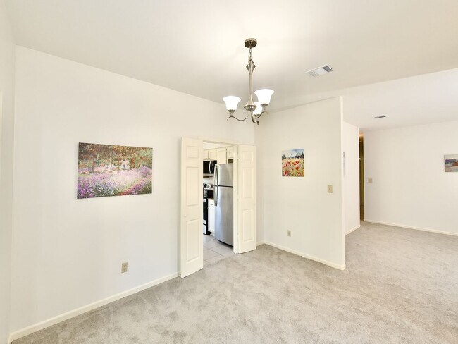 Building Photo - Beautifully Updated Three Bedroom Condo Ne...