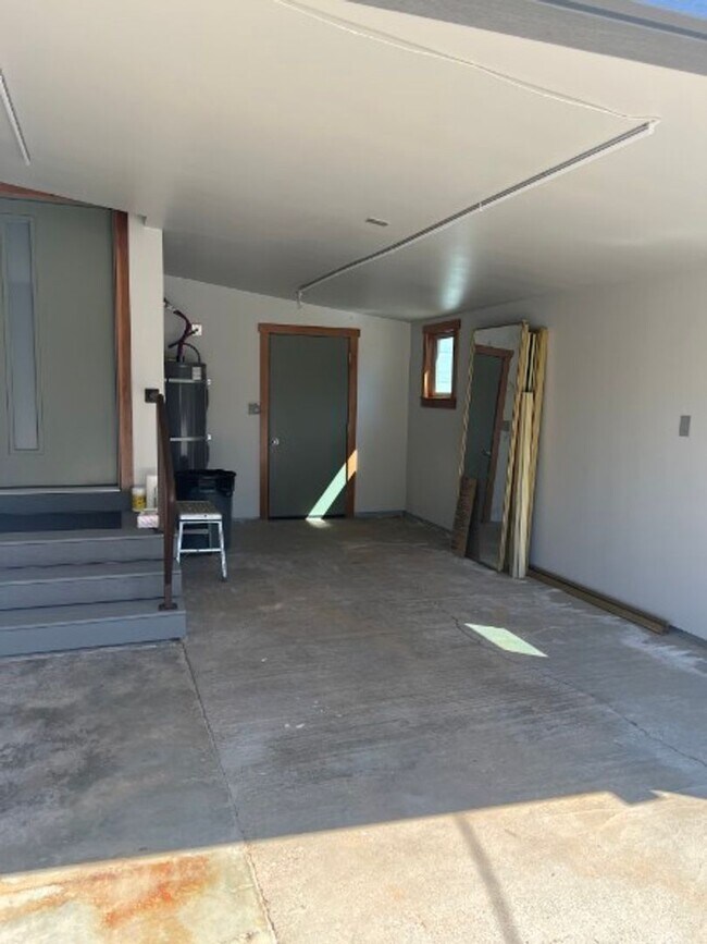 Building Photo - Artisan-Built Custom Cottage Retreat | Private Yard, Garage & EV Charging Ready