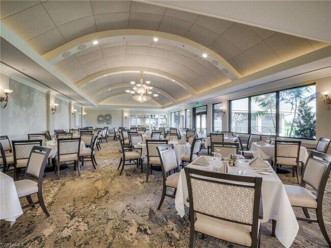 Building Photo - Turnkey 2-bedroom plus den villa, perfectly situated to capture stunning golf course and lake vie...