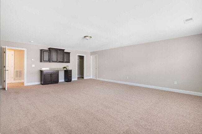 Building Photo - Luxurious 4-Bedroom Retreat with Third Floor Bonus Room & Fenced-in Backyard