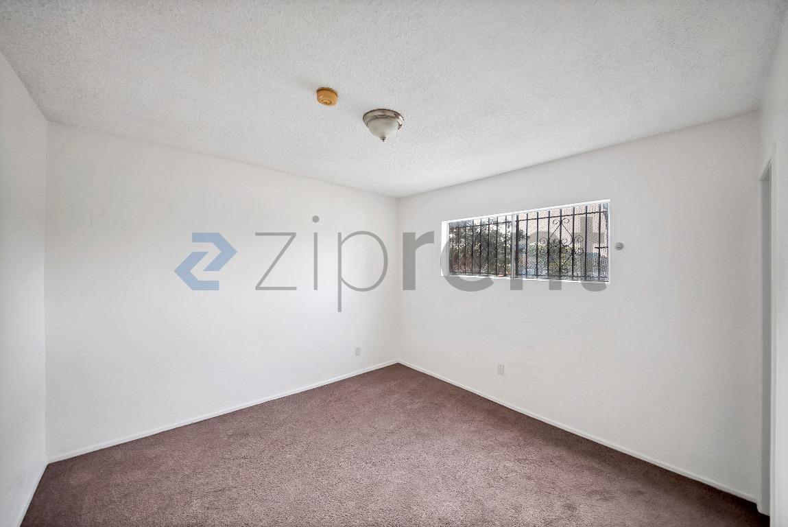 Building Photo - 2458 Normandie Ave