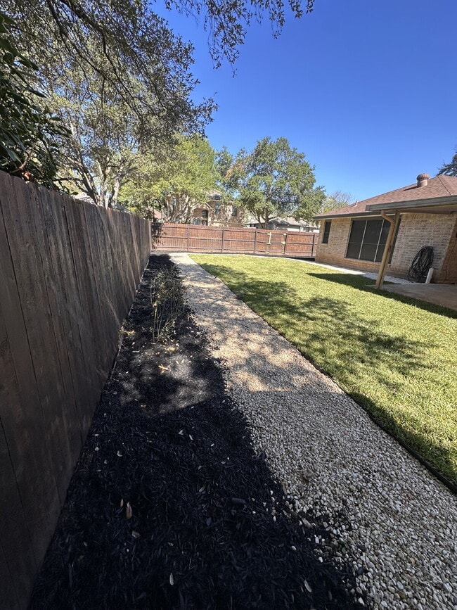 Building Photo - "Charming 4-Bedroom Home with Elegant Gran...