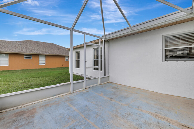 Building Photo - 6480 NW Volucia Dr