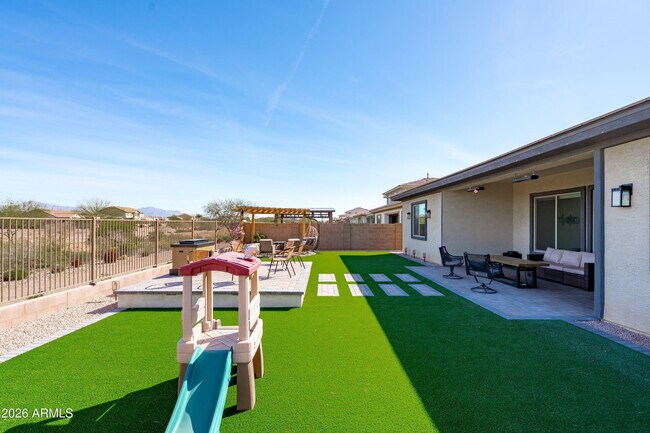 Building Photo - 10812 E Tesla Ave