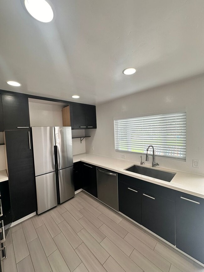 Building Photo - Don't miss out - Single family home close to the beach - LARGE yard, 2 bed 1 bath with bonus studio