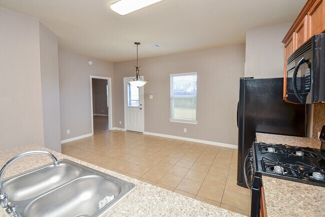 Building Photo - 10806 Woodwind Shadows Dr
