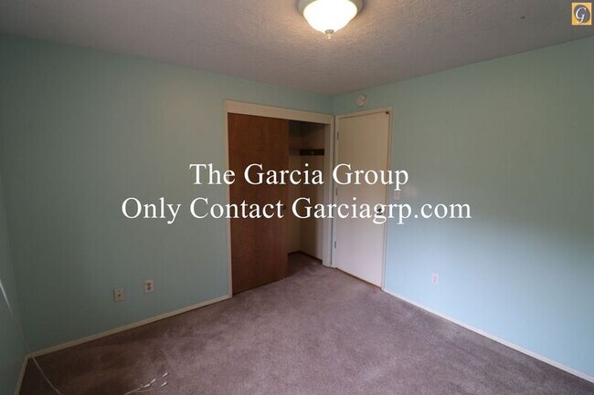 Building Photo - 9585 SW New Forest Dr