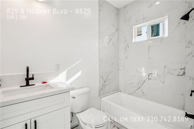 Building Photo - Luxe Living at 825 N. Hobart Blvd. – Where...