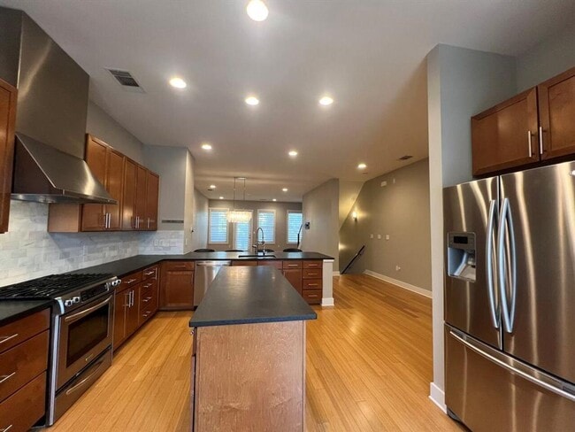 Building Photo - Welcome to SoLa City Homes, where urban el...