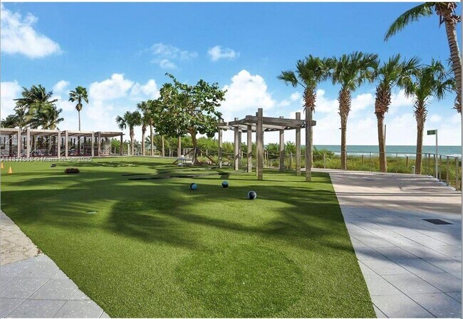 Building Photo - 6899 Collins Ave