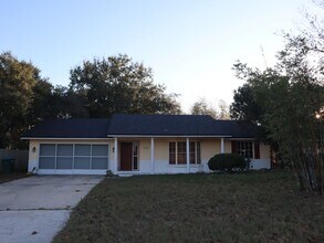 Building Photo - Great Location 3 bedroom 2 Bath 2 Car Garage Call/Text Carole Arcaro 386-216-4900 Deltona Lakes R...