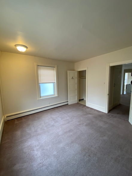 Carpeted bedroom on main level - 311 Nice Ave