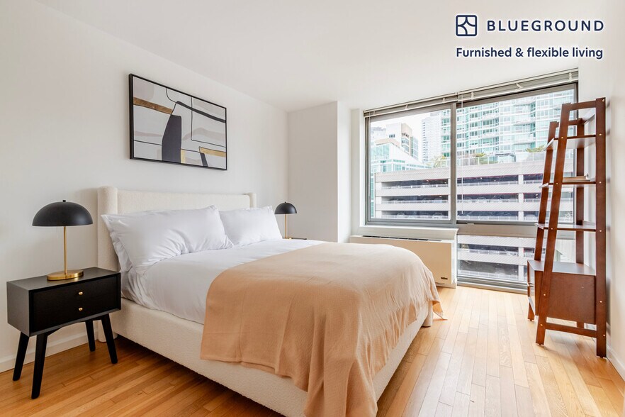 Building Photo - 4-75-75 48th Ave