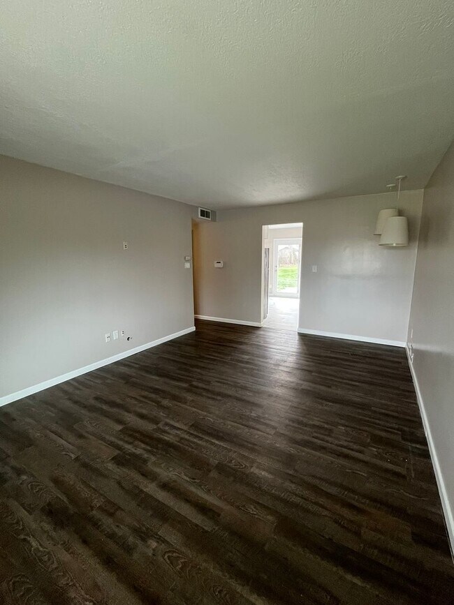 Building Photo - Spacious 3-Bedroom Ranch with 2-Car Garage & Oversized Fenced Backyard