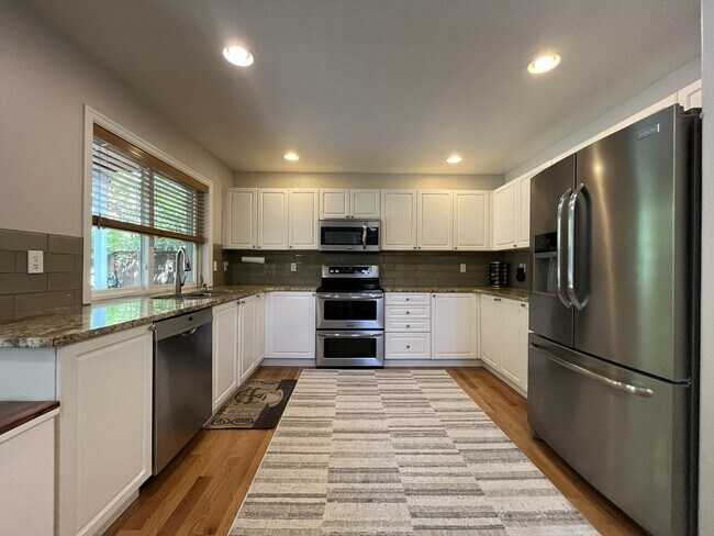 Building Photo - Spacious 3-Bedroom Home with Two Living Areas, Private Balcony, Fireplace & Attached 2-Car Garage