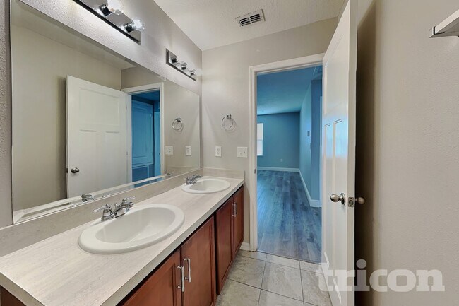 Building Photo - 7105 Feather Wood Dr
