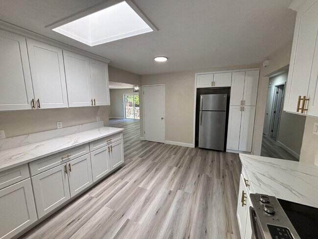 Building Photo - "Completely remodeled 4-Bed, 3-Bath Sanctu...