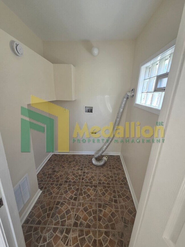 Building Photo - 8725 S Constance Ave