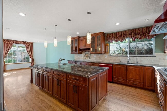 Building Photo - POOL PARADISE IN A COVETED NEIGHBORHOOD STYLISH UPGRADES | EXTREME CONVENIENCE