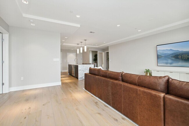 Building Photo - Elegant 2BR at The Adora | 1,500+ SF, Chef’s Kitchen & Garage Parking!