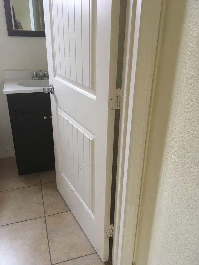 Main bathroom door and sink - 456 E 47th St