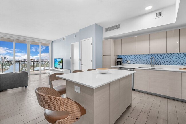 Building Photo - 2602 E HALLADALE T3105