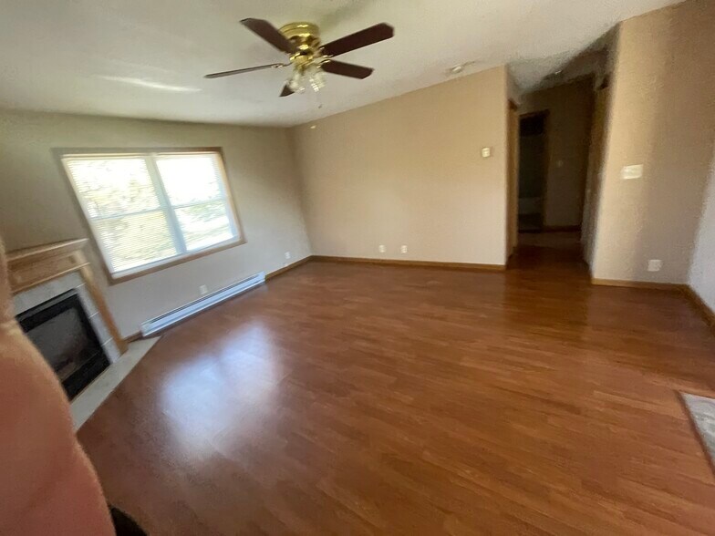 Living room with gas fireplace - 16988 N 7th St