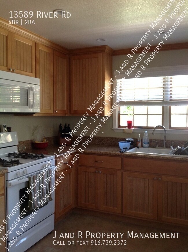 Building Photo - 13589 River Rd