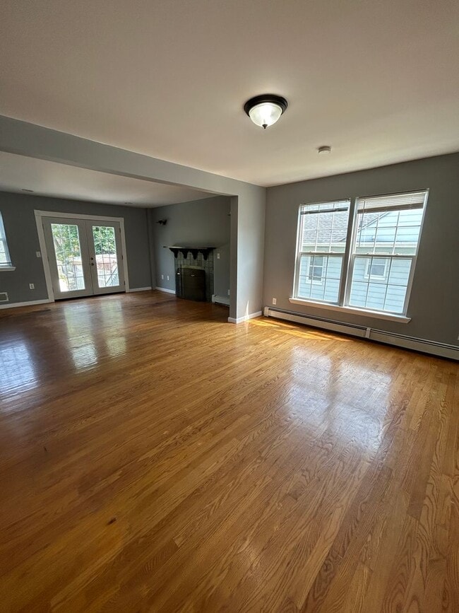 Building Photo - Discover Your Dream Home in Neptune: Spacious 4-Bedroom, 2.5-Bath with Private Backyard and Drive...