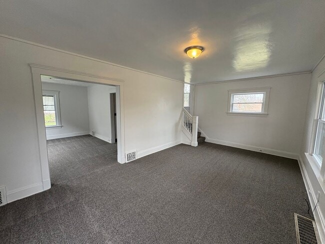 Building Photo - Three bedroom one bathroom 2 story home for rent