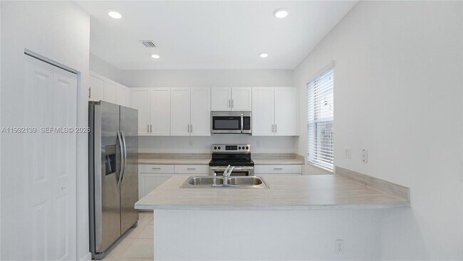 Building Photo - 2676 SE 12th Pl