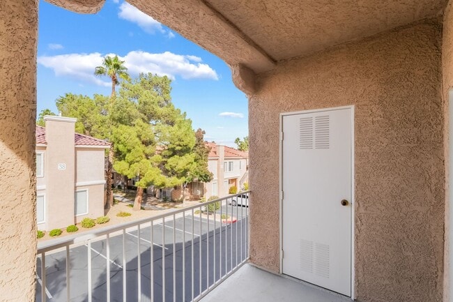 Building Photo - Charming Henderson Condo in Gated Community with Pool Access!