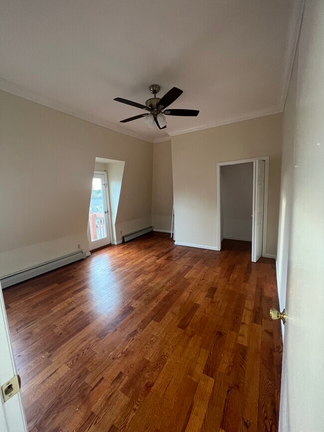 Bedroom 2 in natural day light - 134 S Broadway