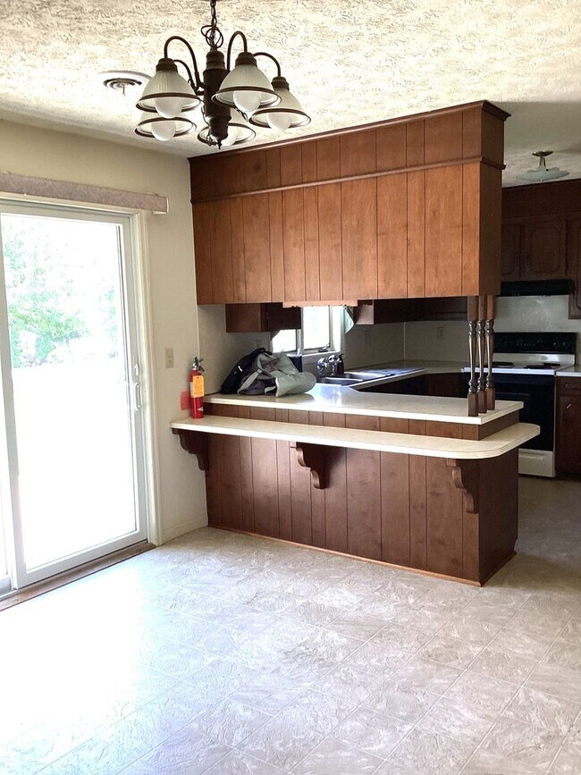 Building Photo - Spacious 3-Bed, 2.5-Bath Ranch-Style Home with Garage & Patio