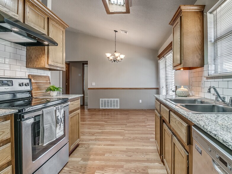 Kitchen looks into the dining room - 1821 Overland Trail