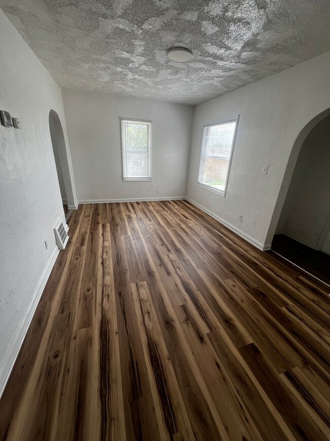 Building Photo - Updated 4-Bedroom 1.5 Bathroom Home with Fenced Yard