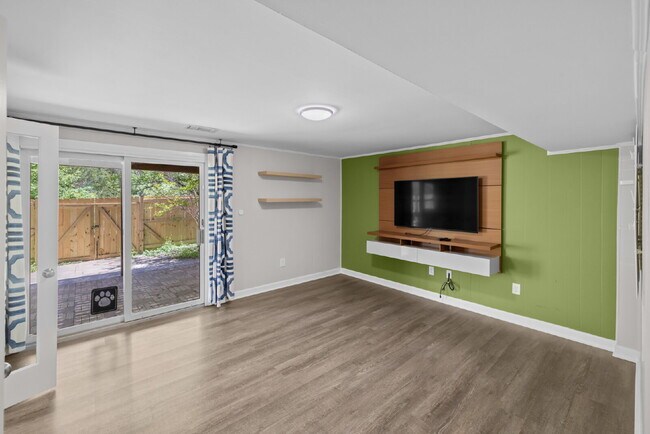 Building Photo - Completely Renovated Corner Townhome with Modern Kitchen, Designer Baths, and Private Yard
