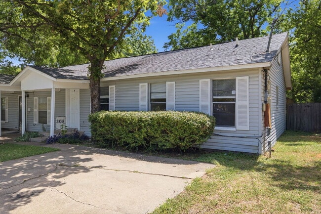 Building Photo - "Charming 2-Bedroom Duplex in White Settlement!"