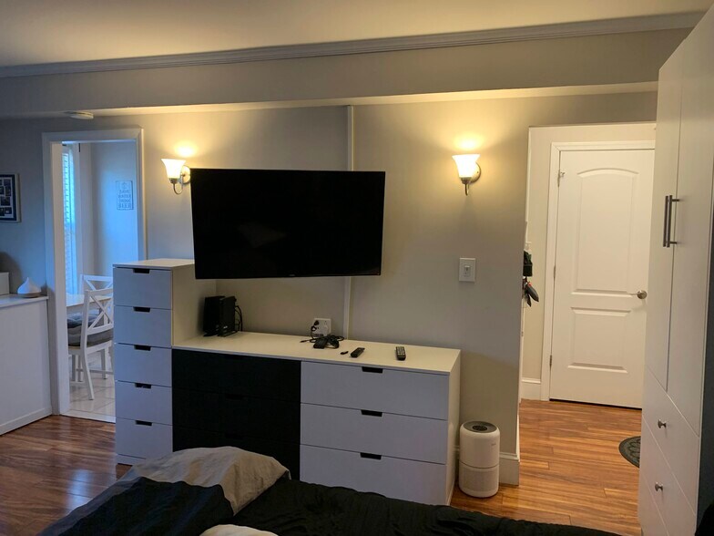 Wall mounted TV can be silted towards bed couch or desk - 160 72nd St